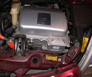 photo 3: the inverter/converter assembly in this prius is located at the top of the engine compartment near the radiator support, making it susceptible to damage in the event of a front-end impact such as this. 