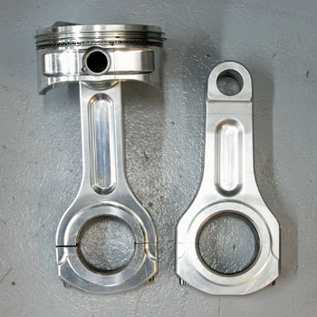 aluminum rods are difficult to use in stroker engines because they have more mass and usually cause interference in the cam and cylinder bore area. the rod on the left has more clearance than the rod on the right, but it is also weaker.