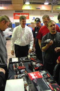 steve rabung, western regional manager for chicago pneumatic, (center) talks to acc students about the tools the auto program was awarded for being the 2011 school of the year. 