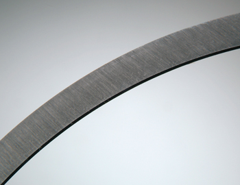new rings have been side lapped to precisely control ring width. when these lapping marks are worn off, it indicates substantial wear has occurred. if the mileage is low, something like excessive heat or abrasive wear has caused the problem.