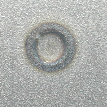 perfect weld: silver colored in the center with a small blue outer circle.