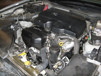 photo 1: it’s difficult to see the dohc in-line 6-cylinder under all of the plastic covers.