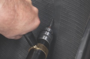 using a low speed drill (max. 500-700 rpm) and a 3/16-inch tapered carbide cutter, ream the injury following the angle of penetration from the inside of the tire. use proper eye protection.
