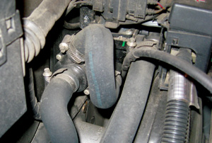photo 1: this auxiliary coolant pump and valve assembly can complicate cooling system  diagnosis.