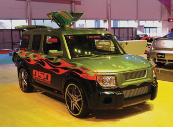 photo 2: custom imports such as this modified honda element are in abundance at car shows throughout the country.