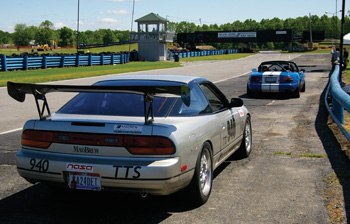 photo 1: besides sanctioned events, many road racing facilities like nelson ledges in ohio, hold open track days for anyone with a car and $120 in his pocket. it’s inexpensive track time fun.