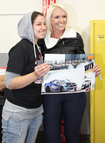 Auto racer Sarah Burgess, right, was on hand to and provide students with an inspiring message on opportunities in the  automotive industry. 