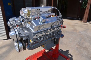 polished aluminum abounds on the sema scholarship engine, thanks to the holley efi, moroso valve covers, edelbrock front cover and water pump and march pulleys.