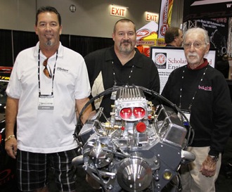 noted engine builder ed pink (right) is joined by mike and rod johnson, who are putting the engine in a classic chevy pickup they’re building for their dad.