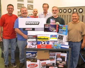 It takes a combination of parts and people to build an engine. Here are Ed Pink Racing Engines staffers (l to r) Tom Schlaak, Bill Wood, Craig McCormick, Lauren Arana, Larry Ingham and Felipe Javier who had a hand in the build. 