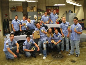 Freedom High School students receive free masking tape from the 3M donation to the Collision Repair Education Foundation.
