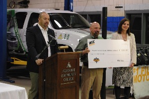 mike harvey, brand manager for wix filters, presents the acc automotive program with a $5,000 donation to be used for tools, equipment, training materials and other classroom/lab needs.
